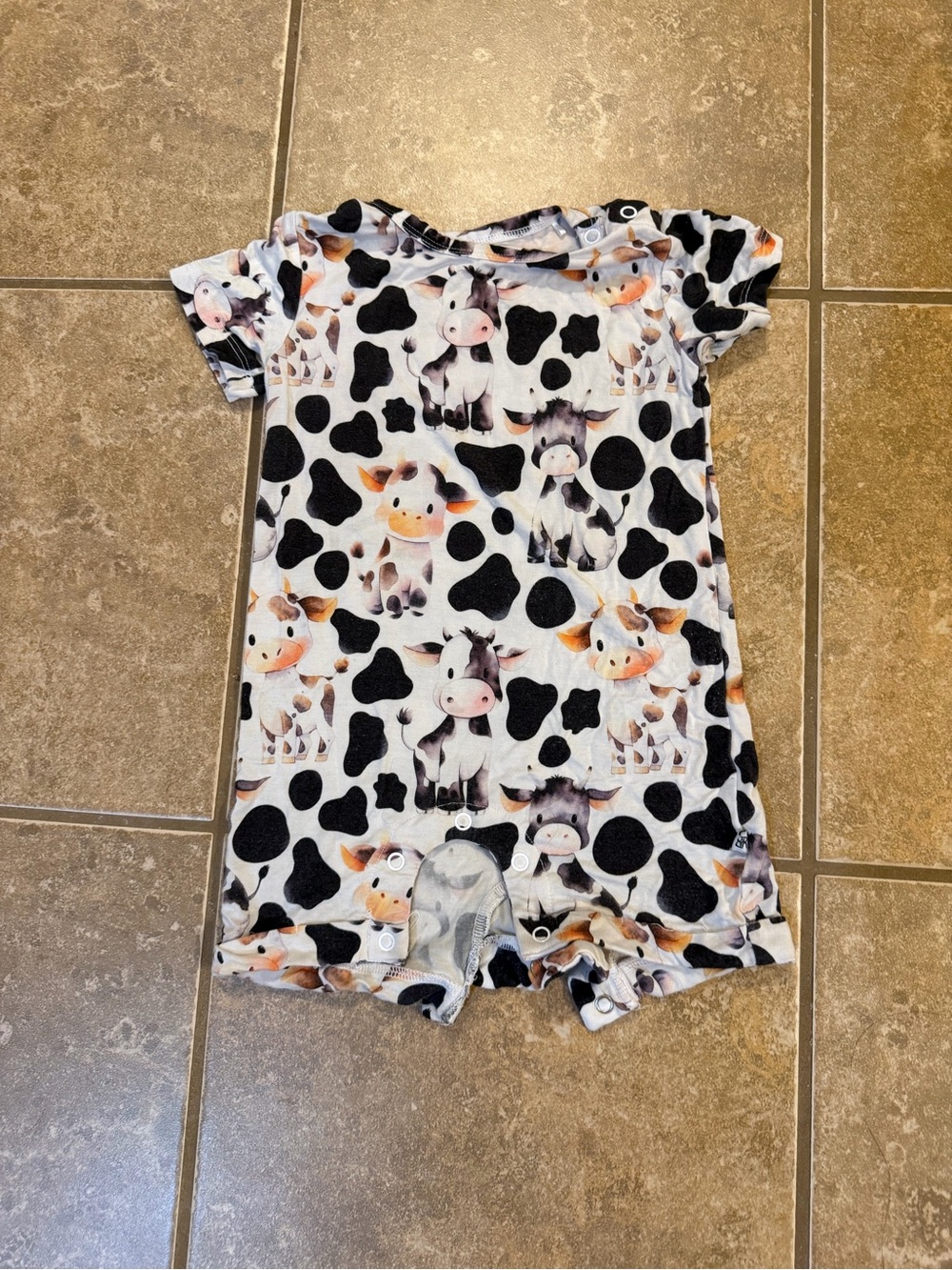 Bums and Roses cow print shortie romper 18-24 months